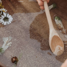 Load image into Gallery viewer, wooden-spoon-mixing-eco-glitter-in-water