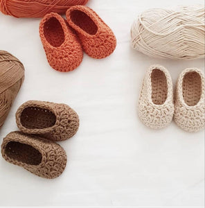 Pairs of premmie knitted baby slippers