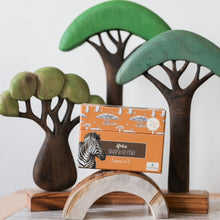 Load image into Gallery viewer, wooden-trees-and-boxed-africa-card-game-setup