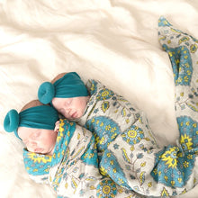 Load image into Gallery viewer, newborn baby girls wrapped in a swaddle
