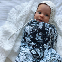 Load image into Gallery viewer, baby-in-bonnet-swaddled-in-black-and-white-wrap