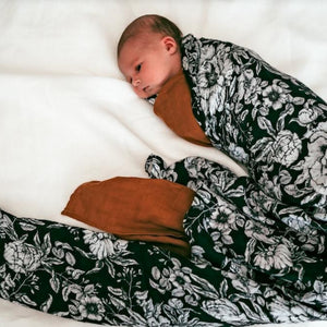 baby-swaddled-in-wrap