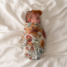 Load image into Gallery viewer, baby-girl-swaddled-in-floral-wrap
