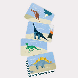 4-dinosaur-cards-lying-on-a-table
